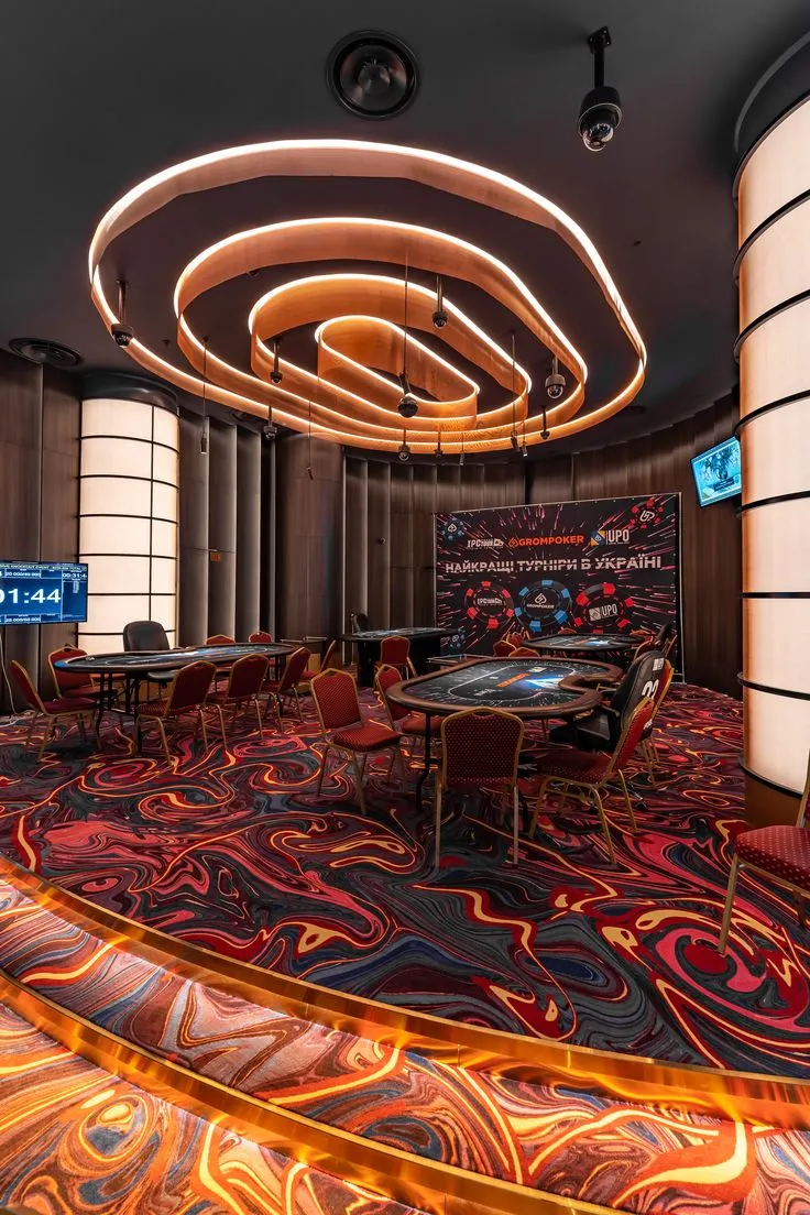 Zen-inspired casino atmosphere with water features and subtle lighting